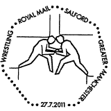 Postmark showing wrestlers.