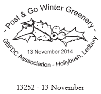 Postmark showing holly branch.