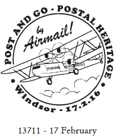 Postmark showing a biplane .